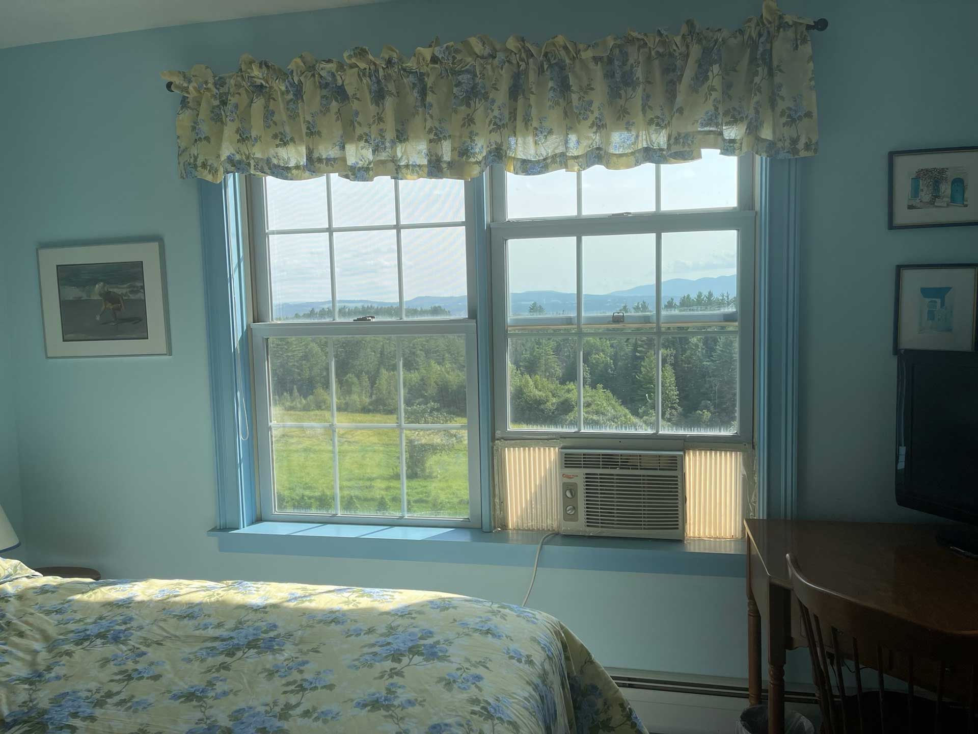 room with a view of the mountains