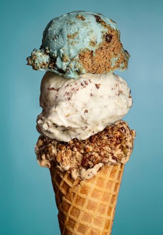 Assorted ice cream on a cone with 3 different flavors