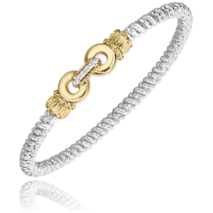 A silver and gold bracelet with diamonds on it