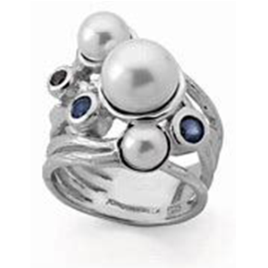 A silver ring with pearls and sapphires on a white background.