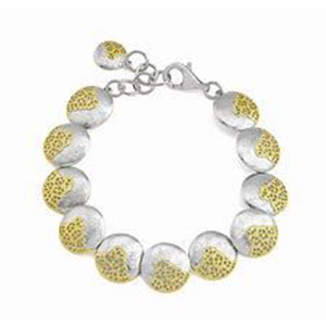 A silver and gold bracelet with yellow beads on a white background.