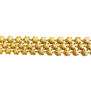 A close up of a gold bracelet on a white background