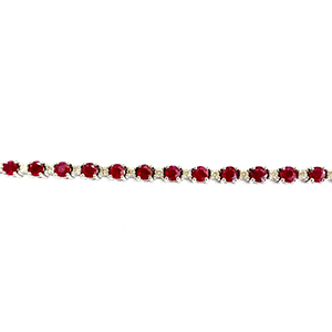 A bracelet with red and white stones on a white background.
