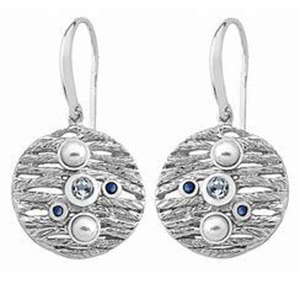A pair of silver earrings with pearls and sapphires on a white background.