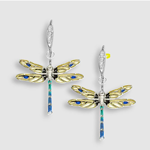 A pair of dragonfly earrings on a white background