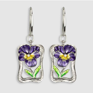 A pair of earrings with purple flowers and green leaves