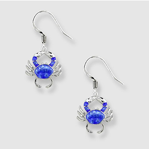 A pair of earrings with blue crabs on them