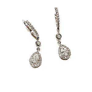 A pair of earrings with diamonds on a white background