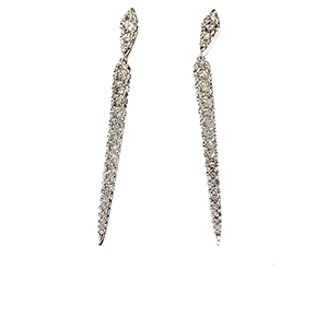 A pair of long diamond earrings on a white background