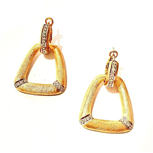 A pair of gold earrings with diamonds on them