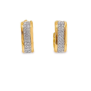 A pair of gold hoop earrings with diamonds on a white background.