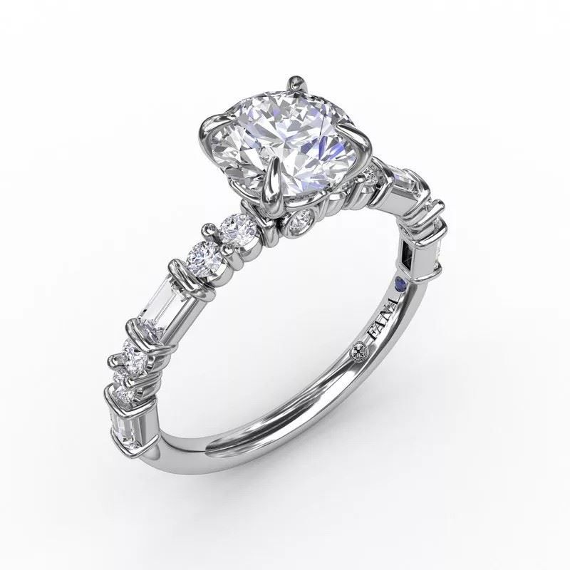 A white gold ring with a diamond in the center