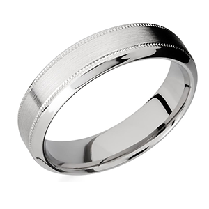A close up of a silver ring on a white background