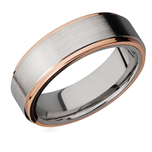 A silver and rose gold ring with a brushed finish