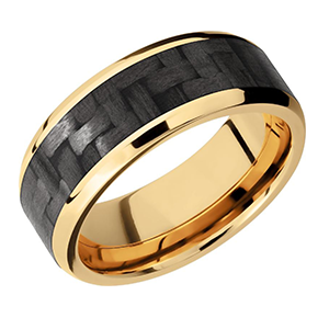 A gold ring with a black carbon fiber inlay
