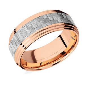 A rose gold ring with a silver stripe on the side