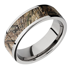 A silver ring with a camo design on it