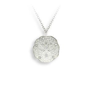 A necklace with a sand dollar pendant on a chain.