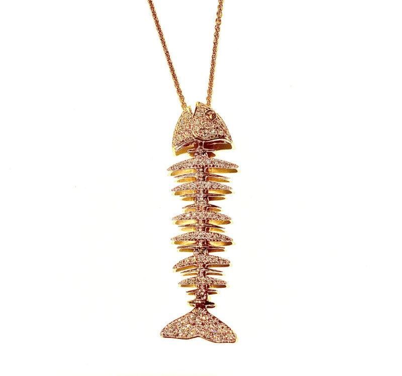 A necklace with a fish skeleton shaped pendant