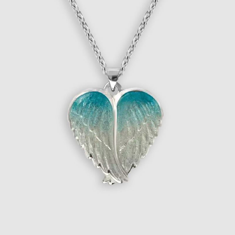 A necklace with a heart shaped pendant on a chain