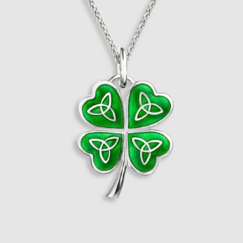 A necklace with a four leaf clover shaped pendant