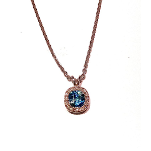 A necklace with a blue stone in the center