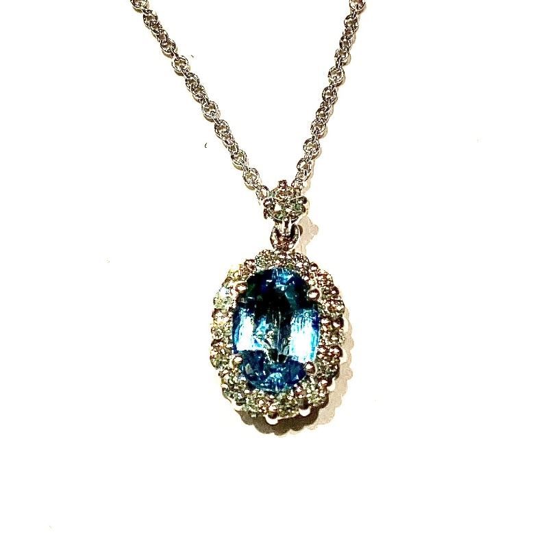 A necklace with a blue stone surrounded by diamonds
