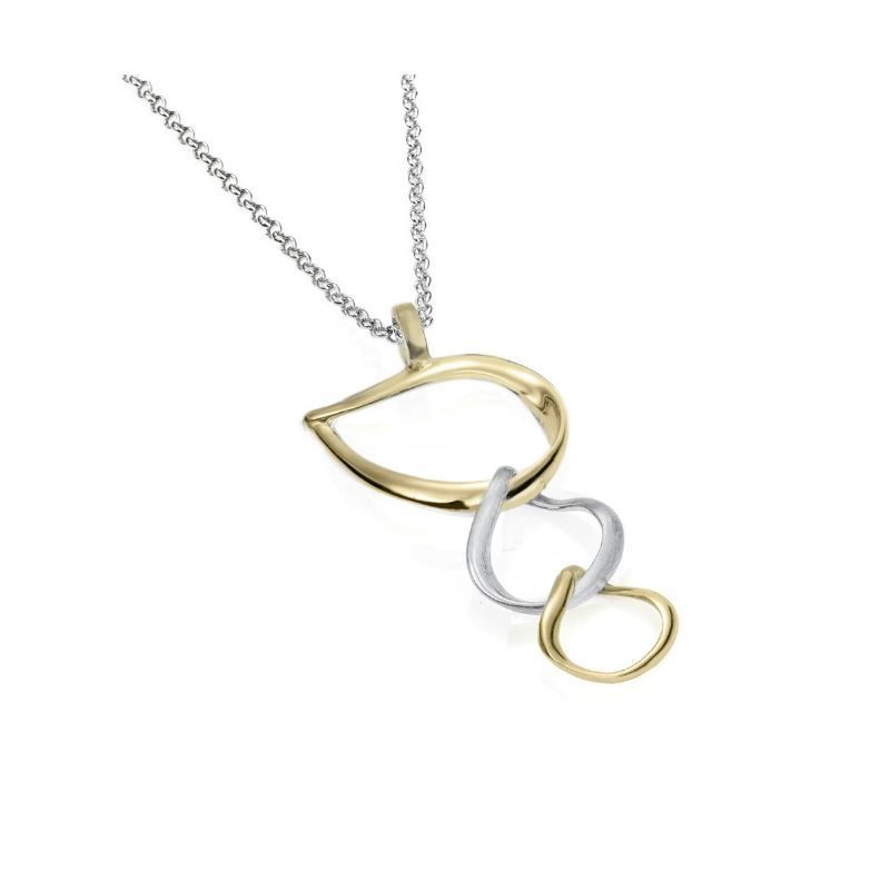 A necklace with a gold and silver pendant on a chain