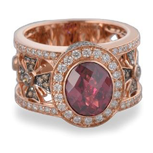 A ring with a pink stone in the center