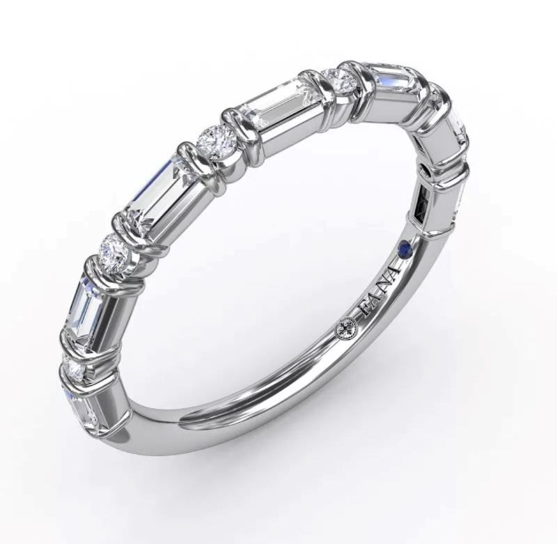 A white gold ring with baguette and round diamonds
