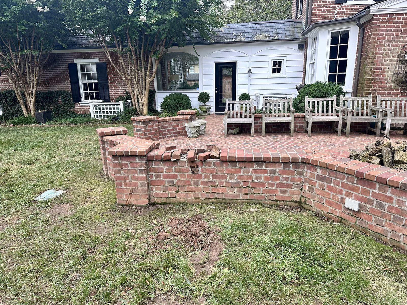 Damaged patio due to a fallen tree