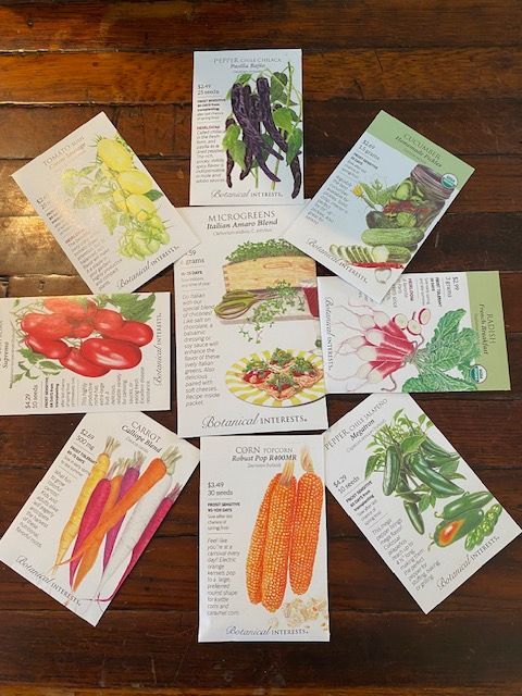 a bunch of vegetable seed packets are arranged in a circle