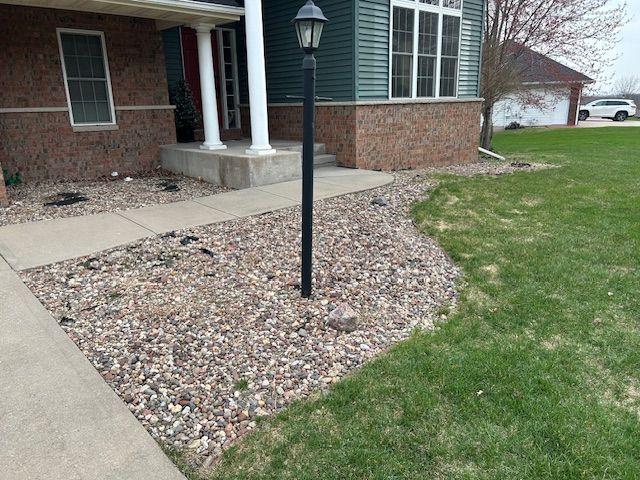 A house with a lamp post in front of it