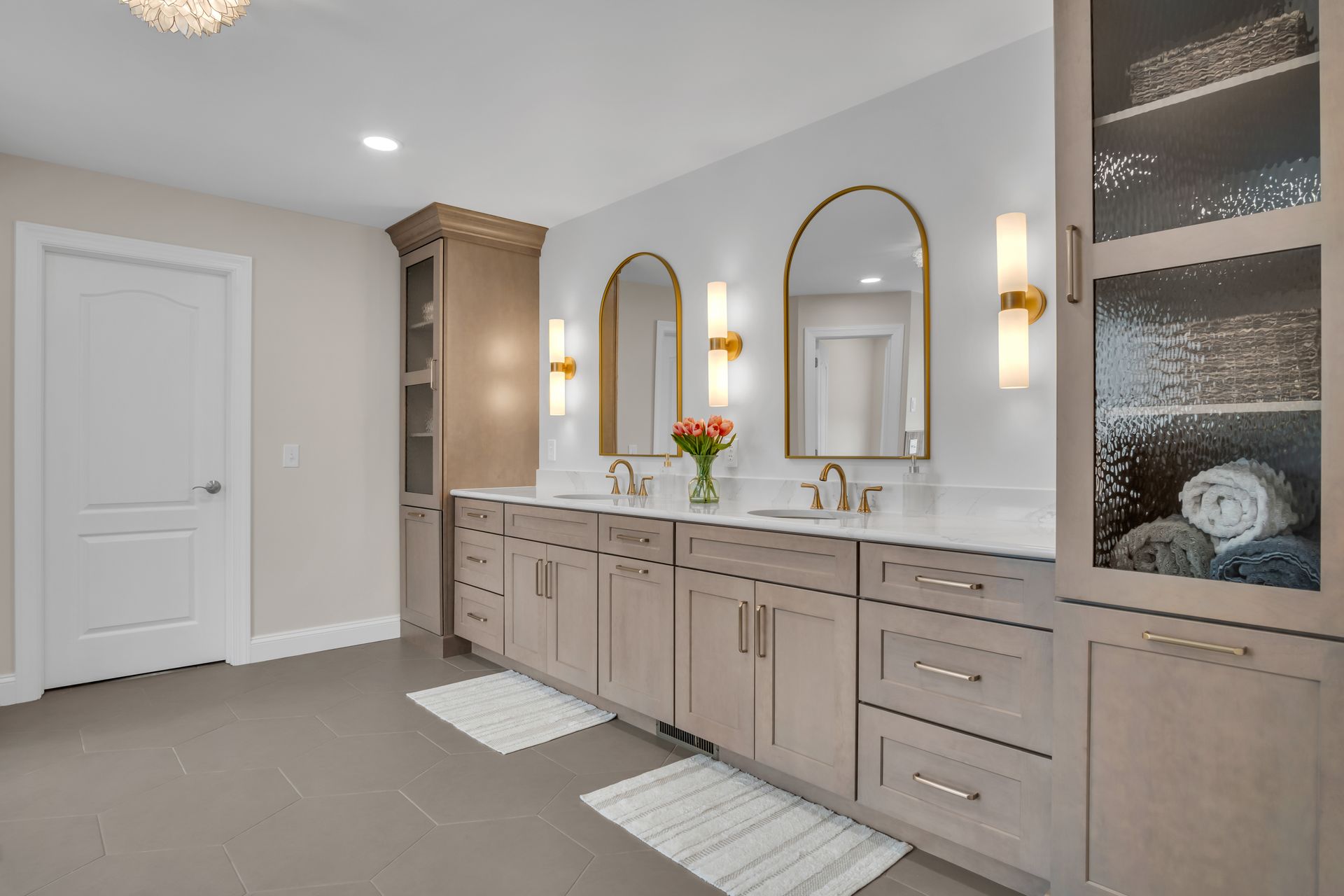 A bathroom with two sinks and two mirrors.