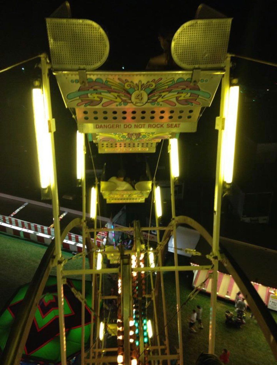 An aerial view of a carnival ride at night