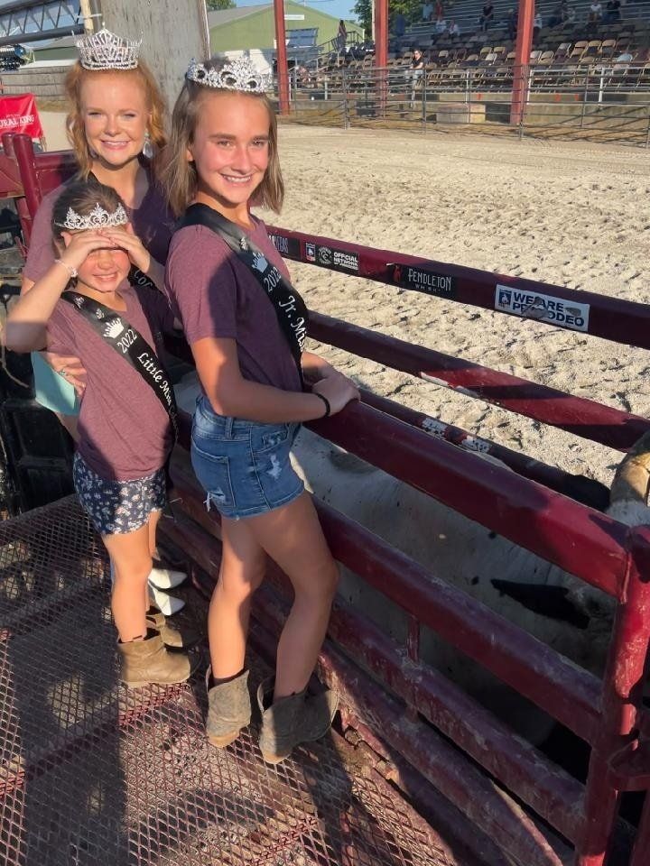 bull pen and two women