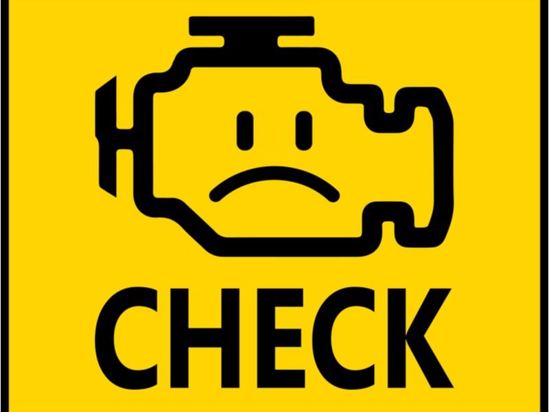 Yellow check engine warning light icon with sad face and the word “CHECK”