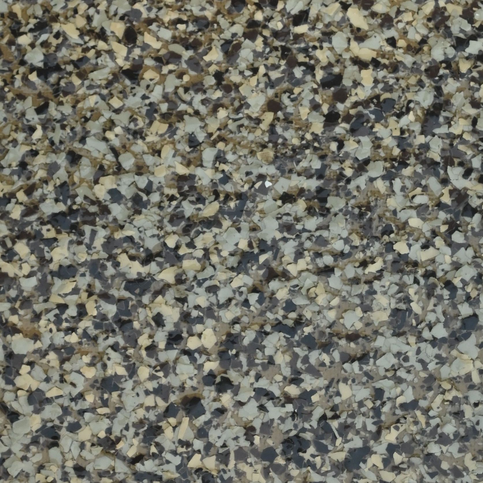 A piece of brian wood sits on a white surface