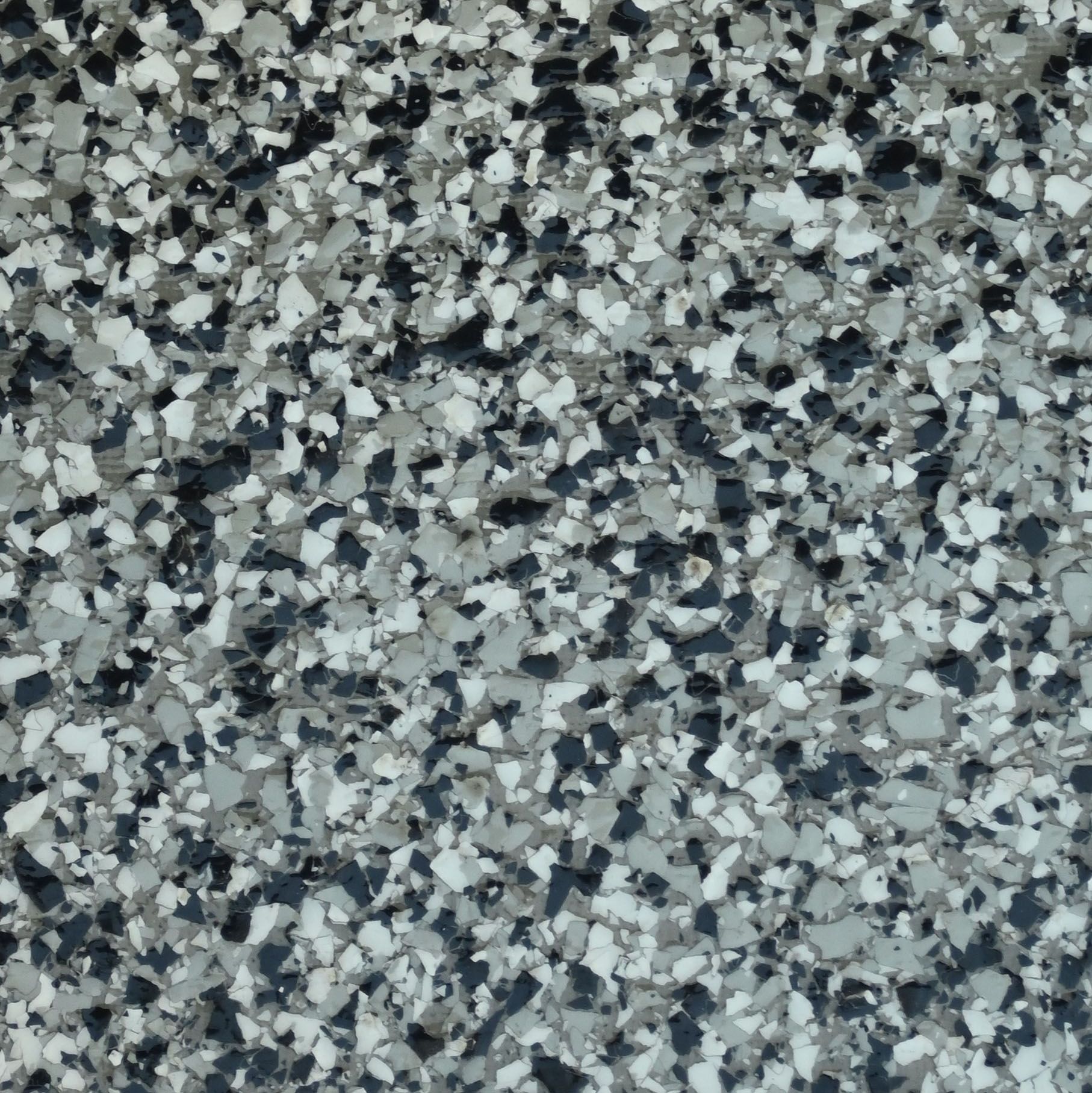 A piece of granite that says domino on it