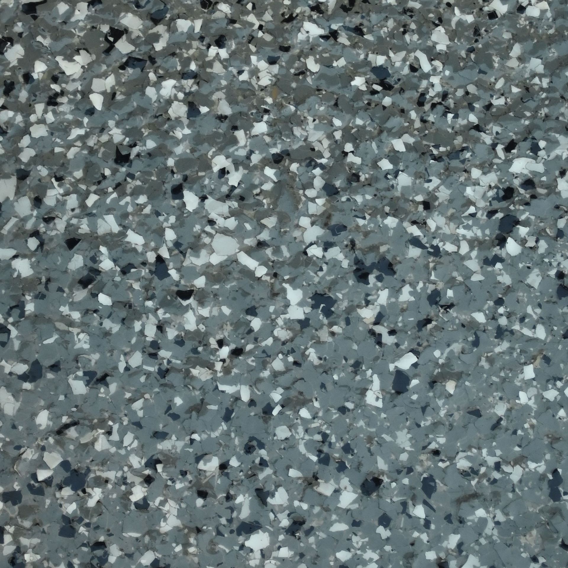 A piece of flint stone sitting on a white cloth