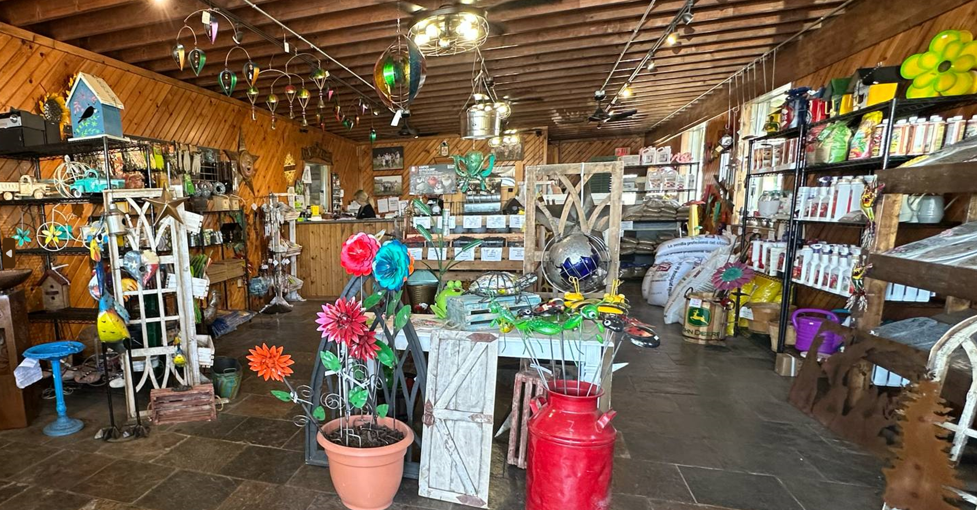 Two baskets with sunflowers on them are on a shelf