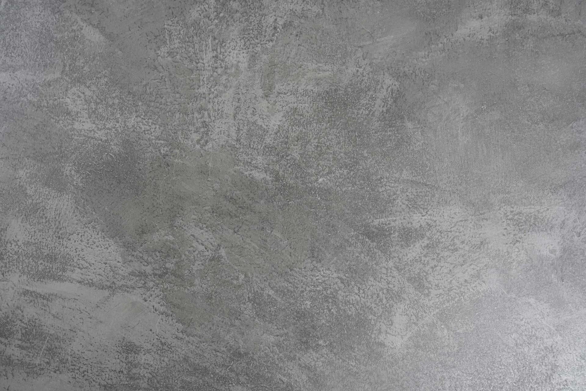 Gray mottled concrete surface.