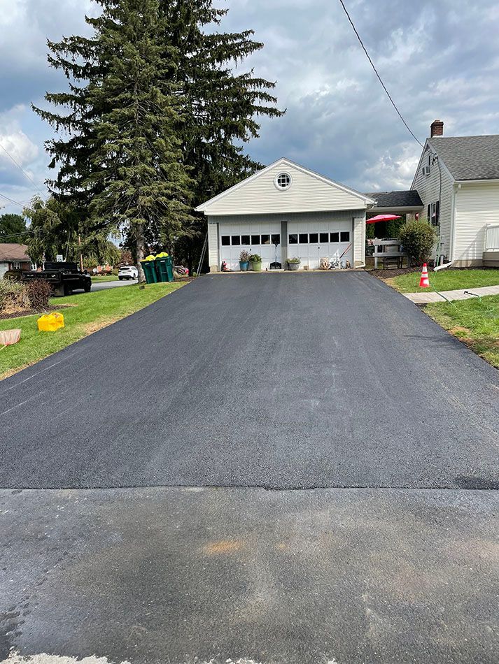 Residential asphalt driveway paving