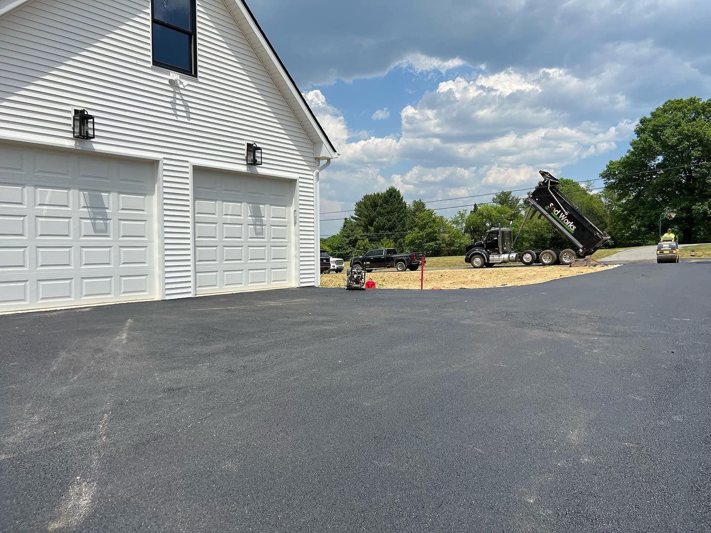 Residential asphalt driveway paving