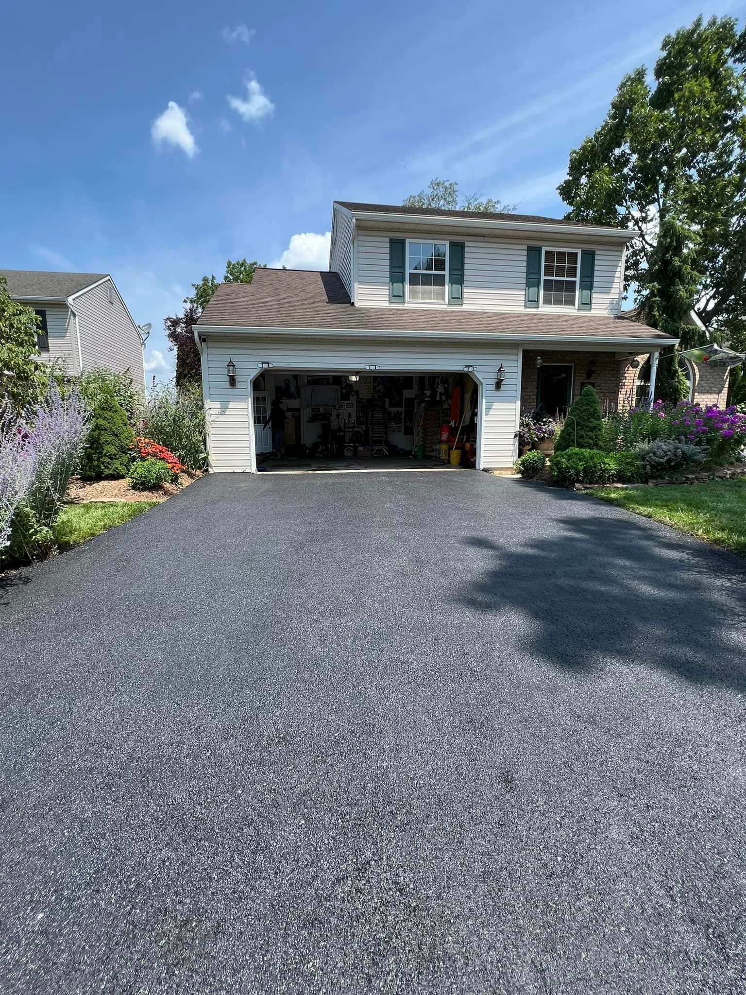 Residential asphalt driveway paving
