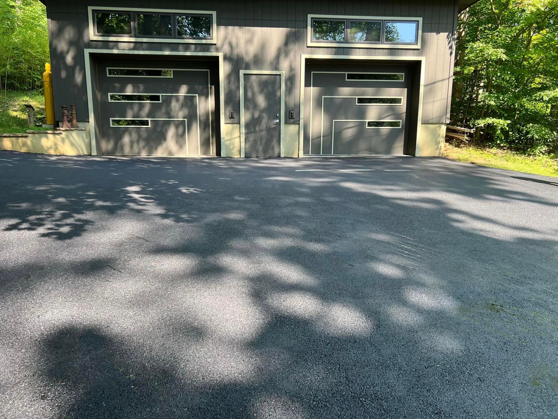 Residential asphalt driveway paving