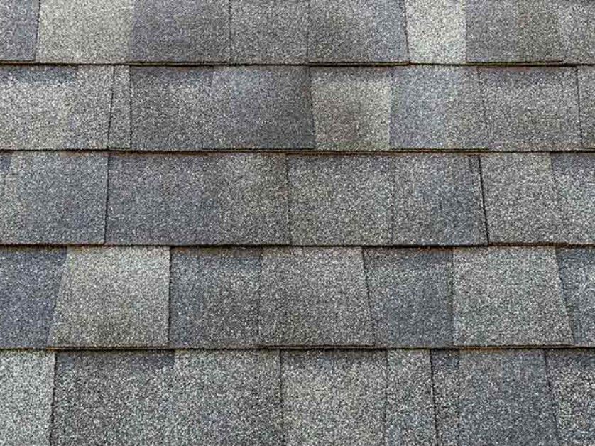 A close up of a roof with shingles on it.