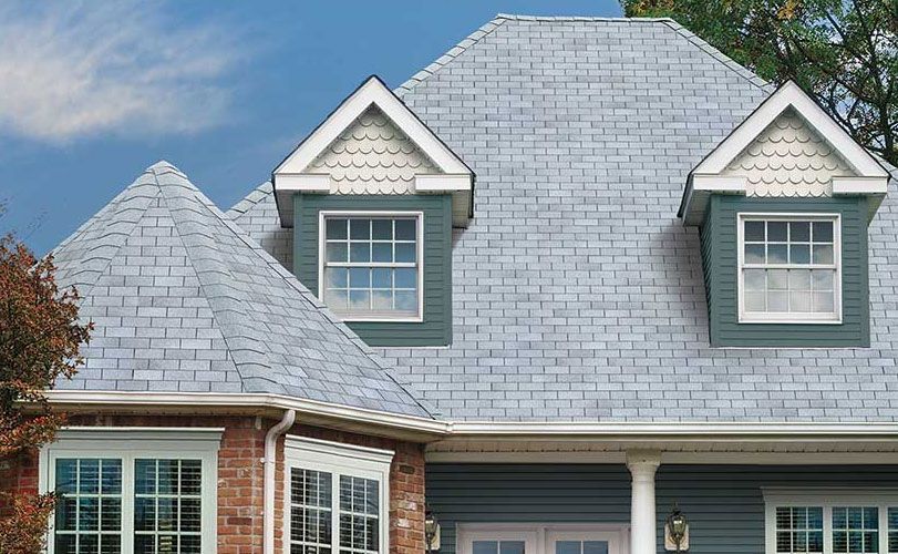 A house with a white roof and two windows