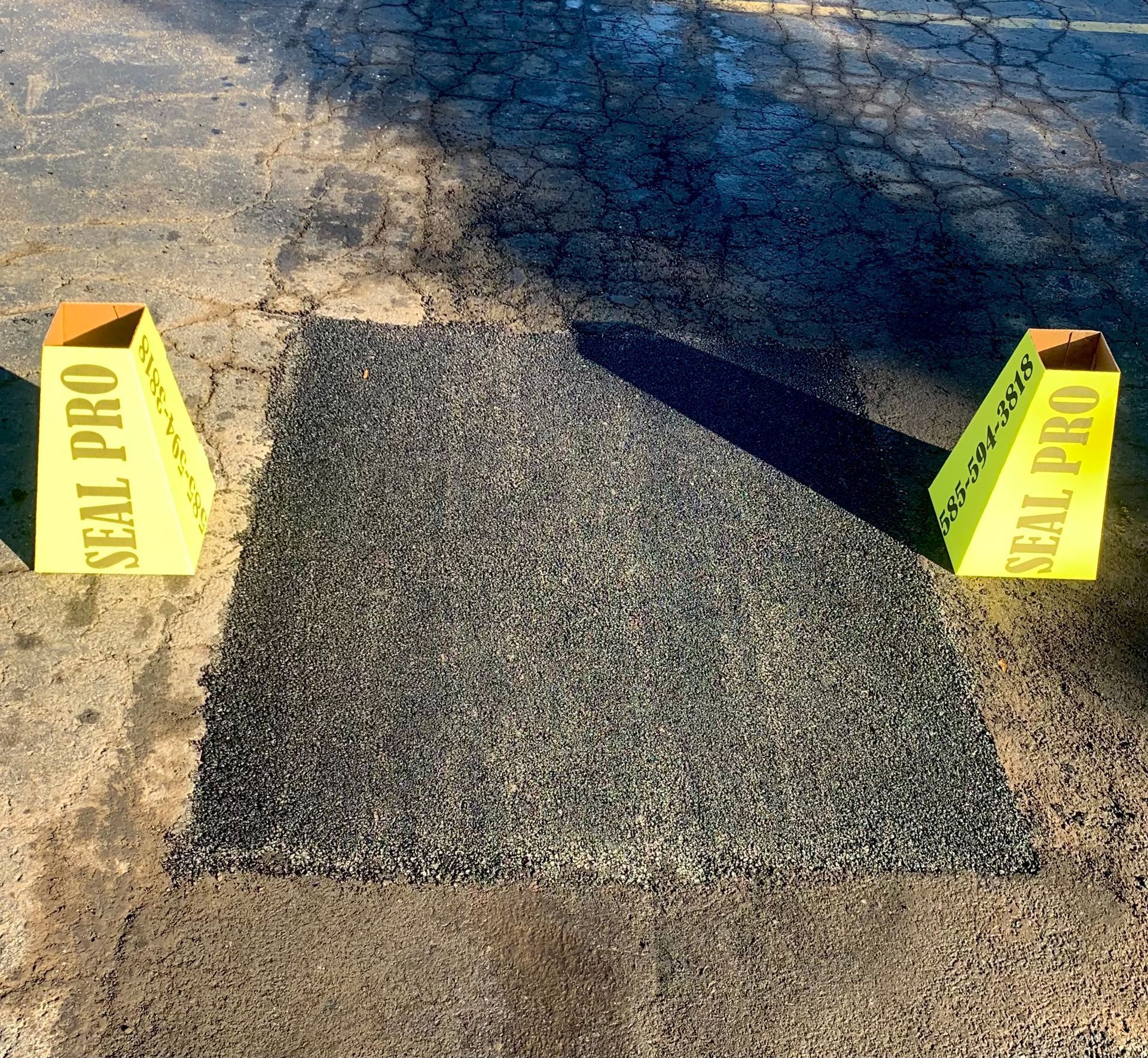 two yellow cones that say seal pro on them