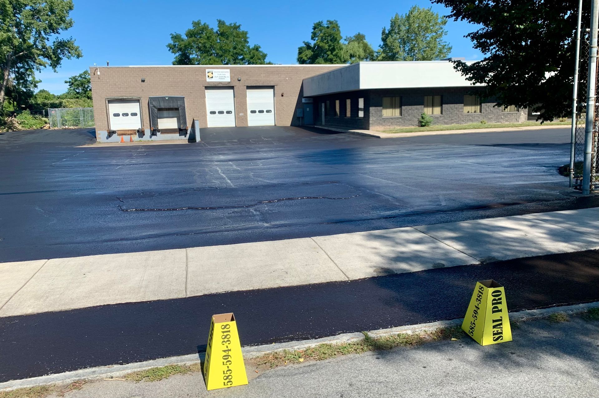 a parking lot with a sign that says open pro
